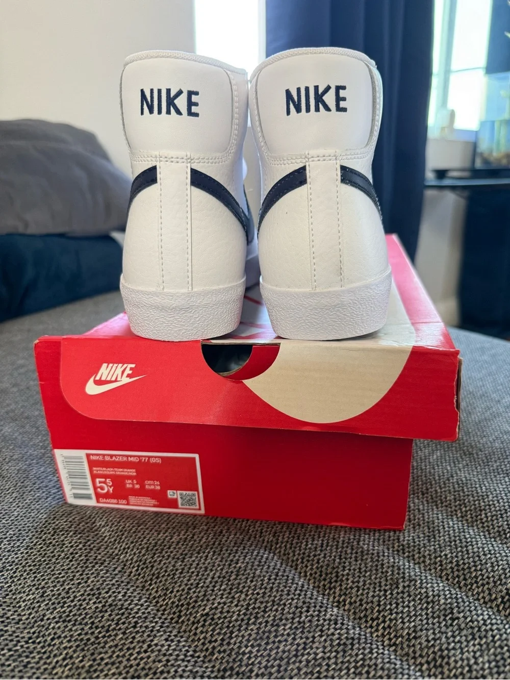 Nike Blazer Mid White/Black High-Top Sneakers (grade school)